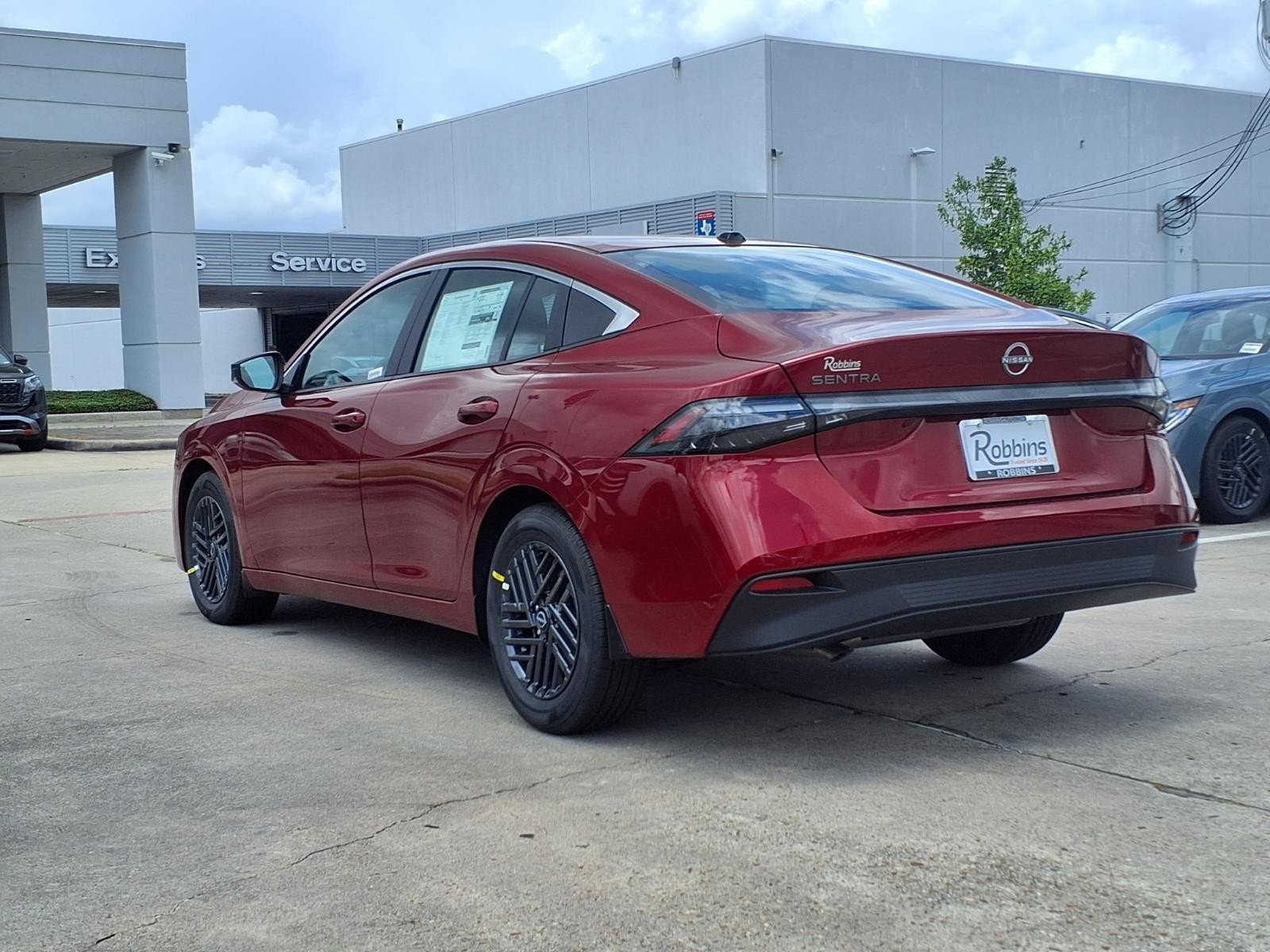 New 2026 Scarlet Ember Tintcoat Nissan SV image 7
