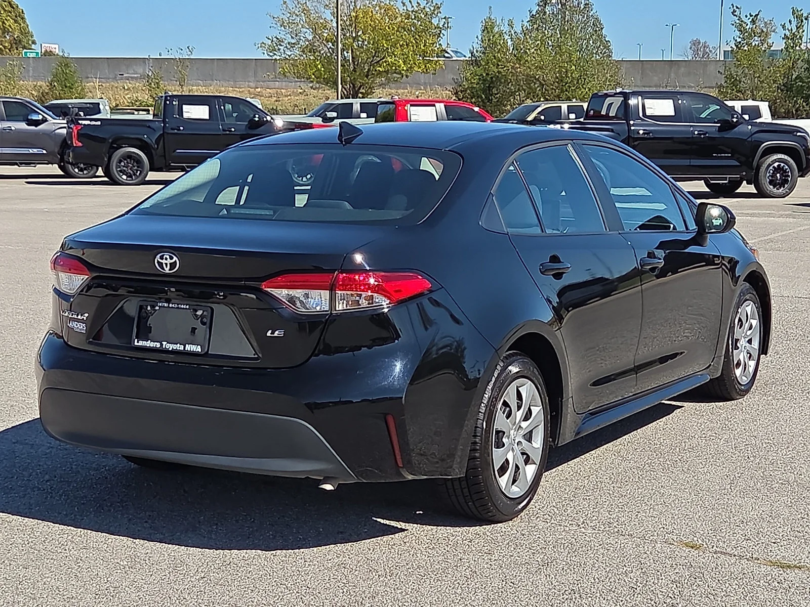 Used 2025 Midnight Black Metallic Toyota LE image 5