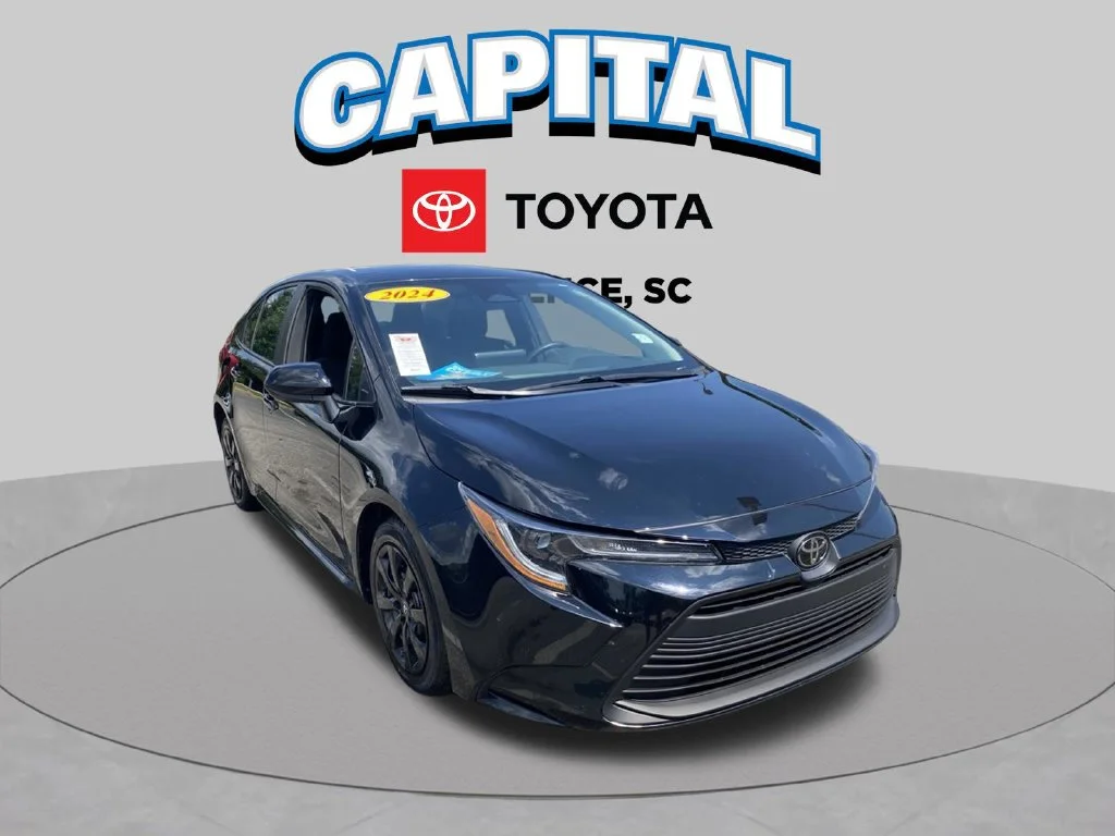 Used 2024 Black Toyota LE image 1