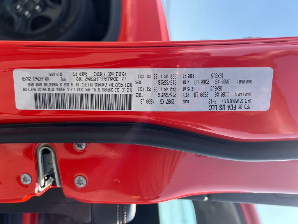 Used 2018 Orange Jeep Sport image 26