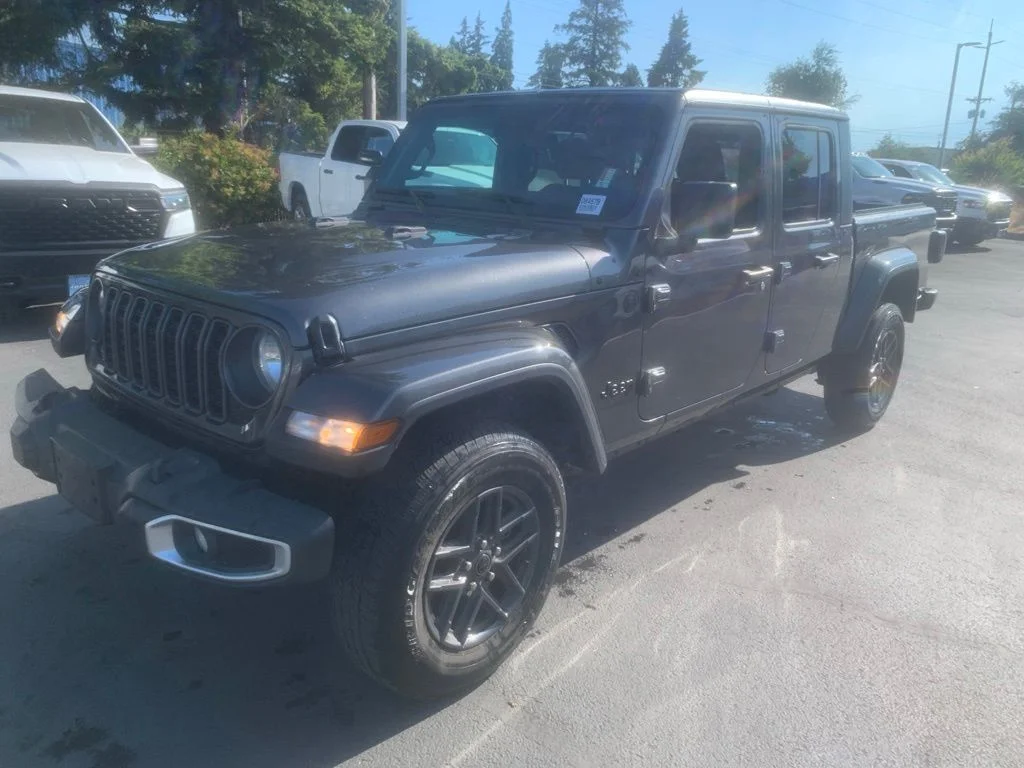 Used 2024 Granite Crystal Metallic Clearcoat Jeep Sport S image 1