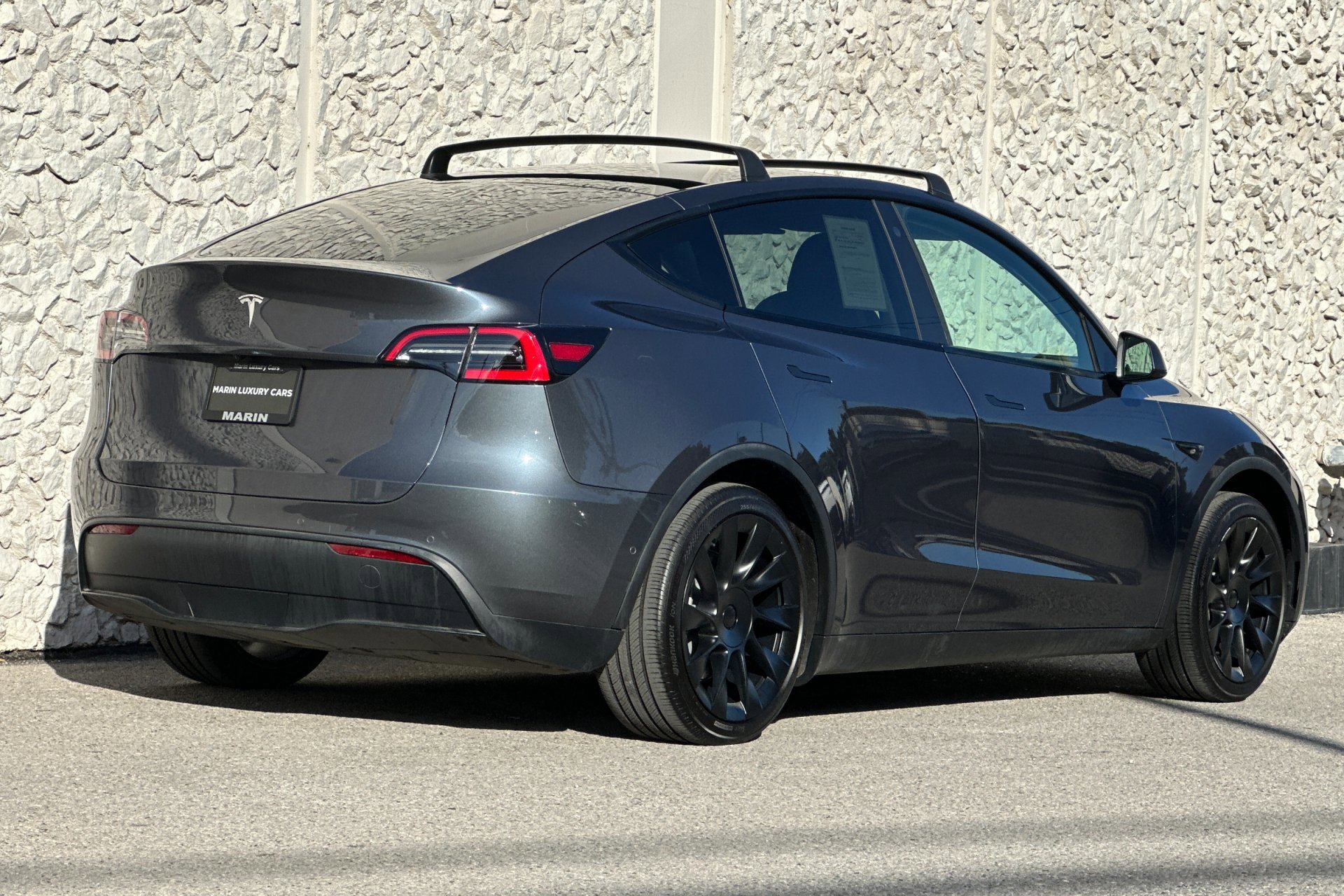 Used 2021 Tesla Model Y Standard Range with VIN 5YJYGDED8MF126180 for sale in Kansas City