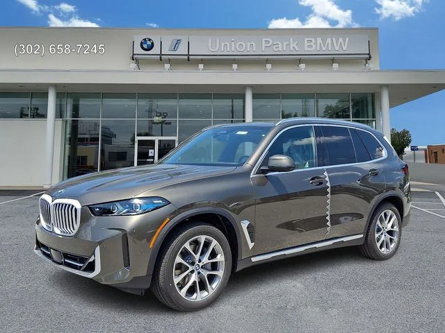 New 2026 Manhattan Green Metallic BMW xDrive40i image 1