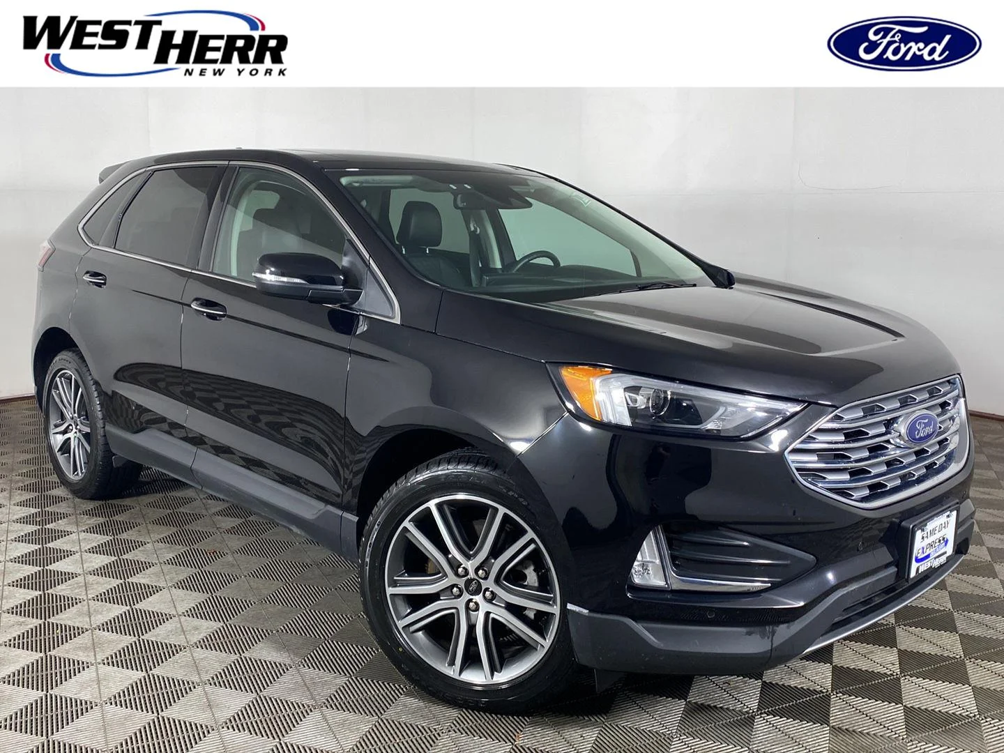 Used 2024 Agate Black Ford Titanium image 1