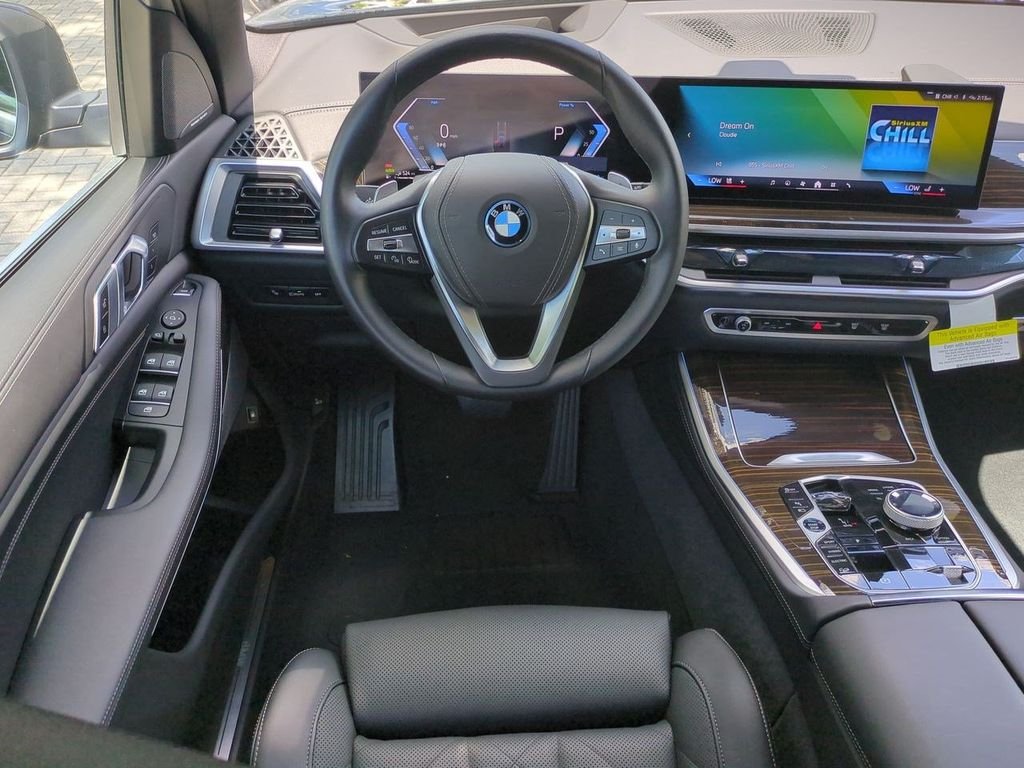 New 2026 Black Sapphire Metallic BMW xDrive50e image 16