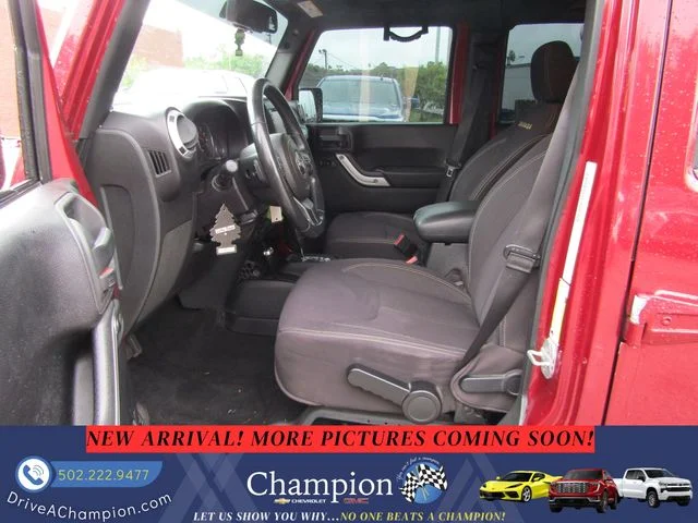 Used 2013 Red Jeep Unlimited Sahara image 10