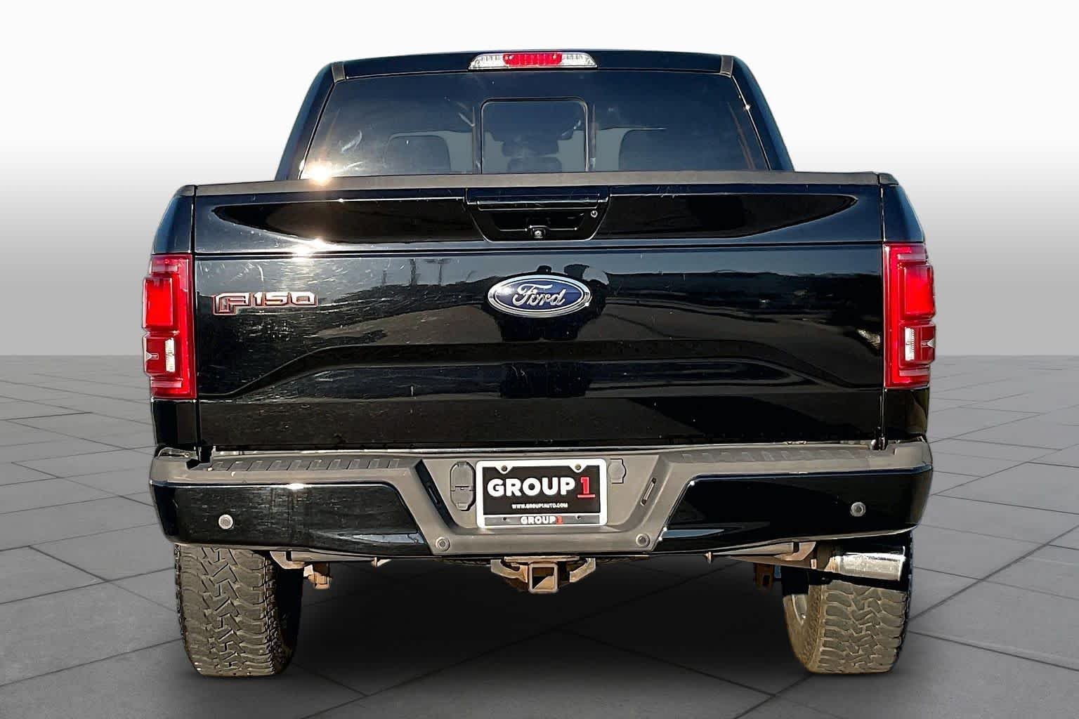 Used 2017 Shadow Black Ford Lariat image 5