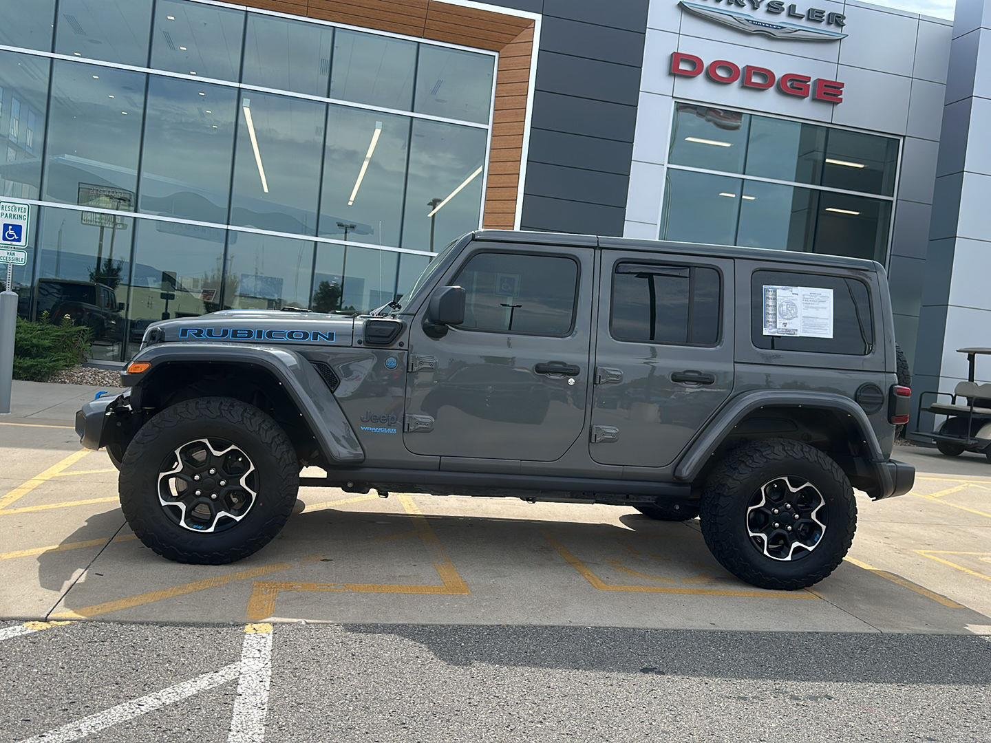 Used 2022 Jeep Wrangler Unlimited Rubicon 4XE with VIN 1C4JJXR63NW111390 for sale in Kansas City