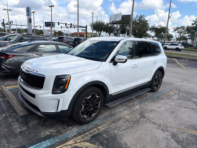 Used 2022 Glacial White Pearl Kia LX image 1