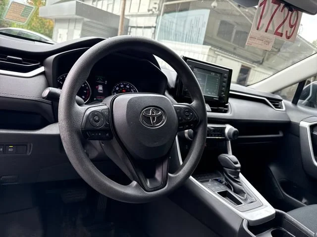Used 2021 Super White Toyota LE image 17