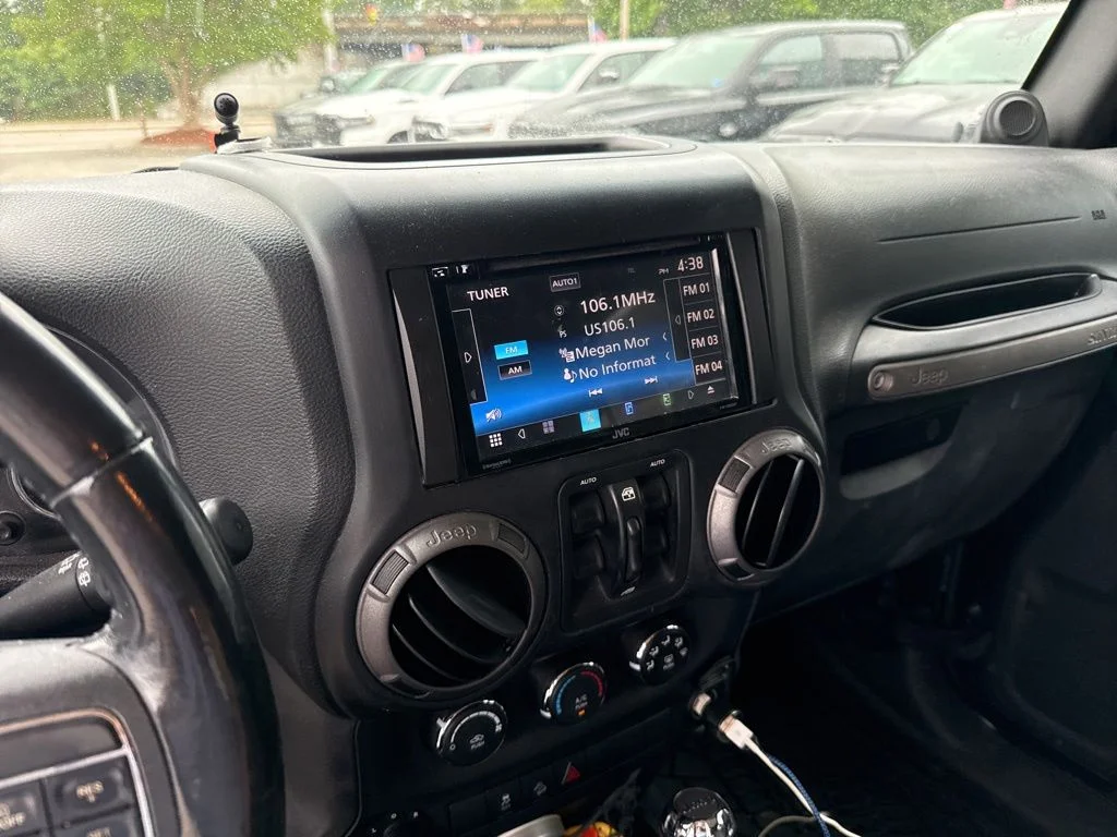 Used 2012 Black Jeep Unlimited Sport image 5