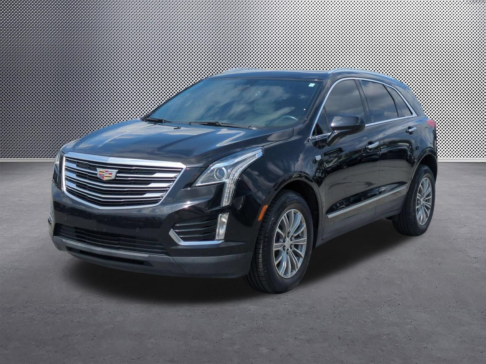 Used 2018 Stellar Black Metallic Cadillac Luxury FWD image 1