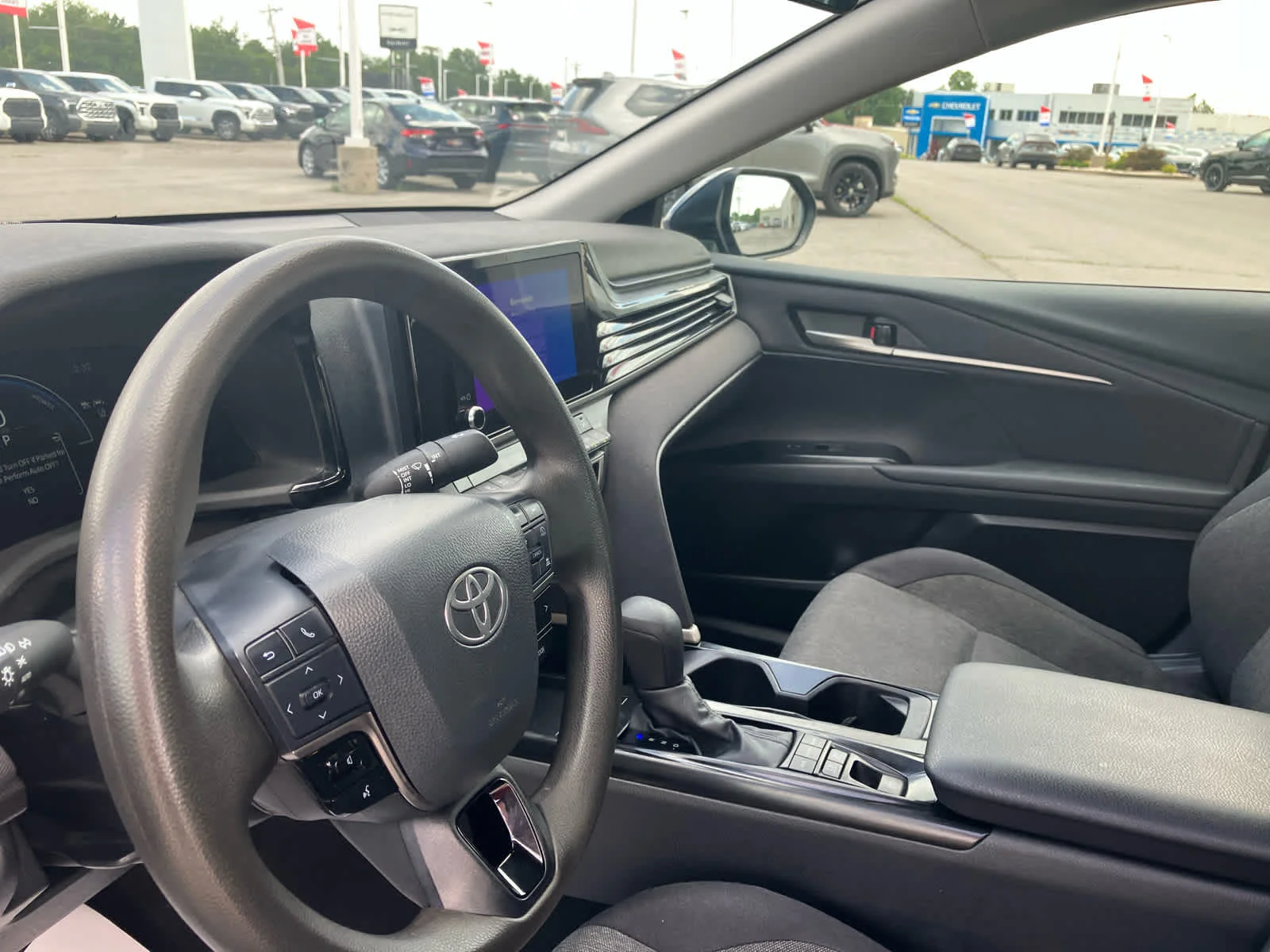 Used 2025 Reservoir Blue Toyota LE image 9