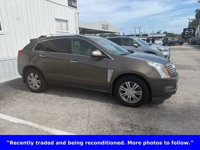 Used 2014 Brown Cadillac Luxury image 1