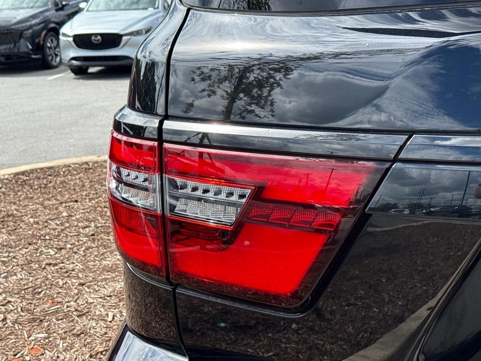 Used 2023 Super Black Nissan SL image 13