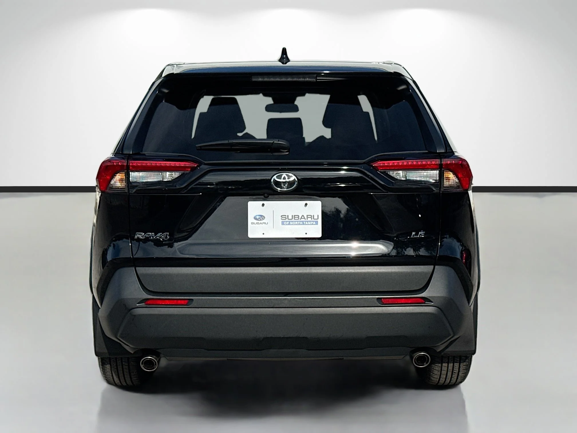 Used 2025 Midnight Black Metallic Toyota LE image 4
