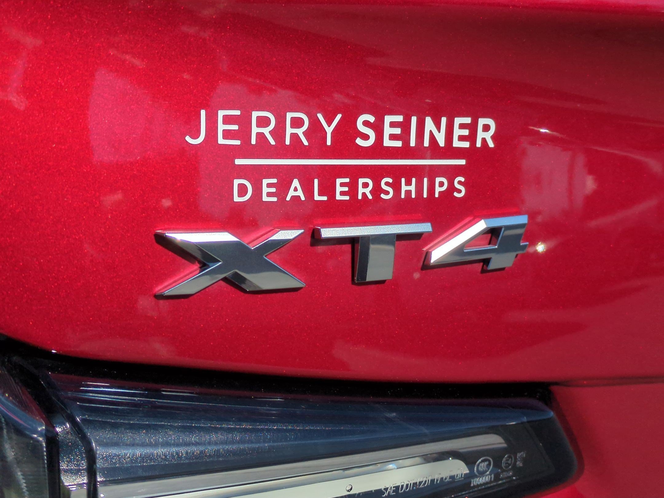 Used 2024 Radiant Red Tintcoat Cadillac Sport image 27