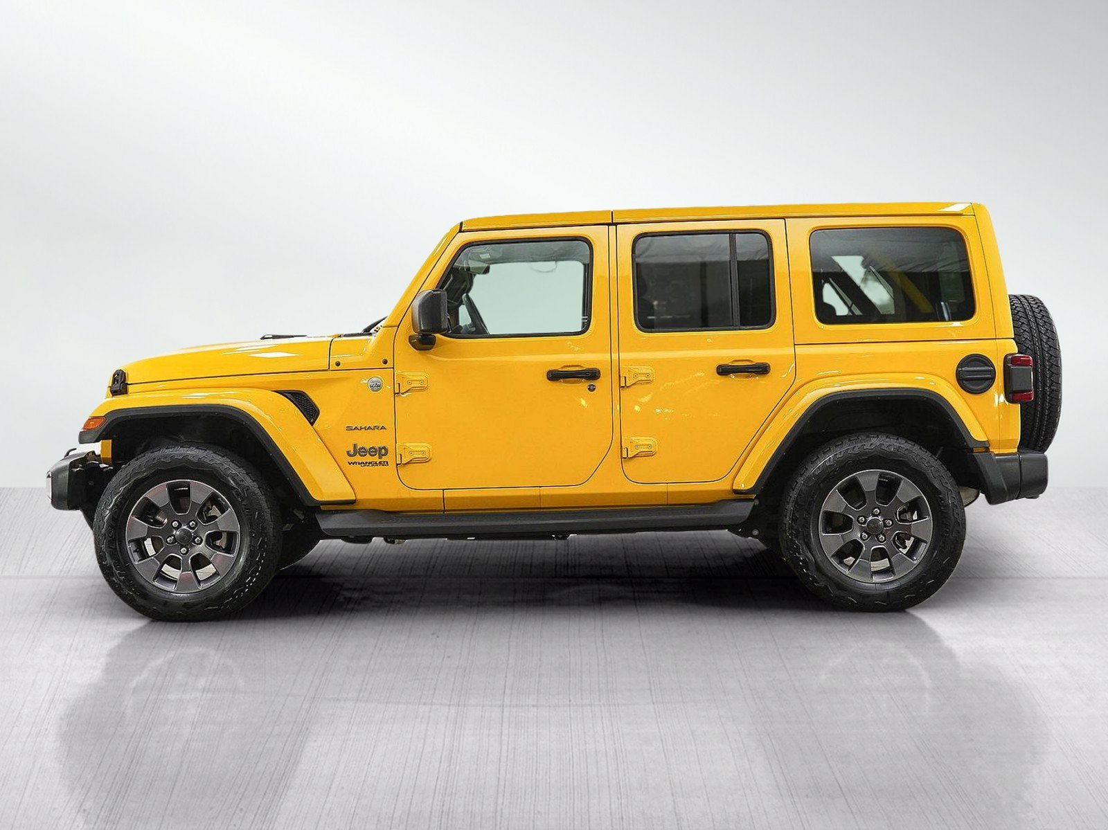 Used 2019 Jeep Wrangler Unlimited Sahara with VIN 1C4HJXEN9KW526043 for sale in Minneapolis, Minnesota