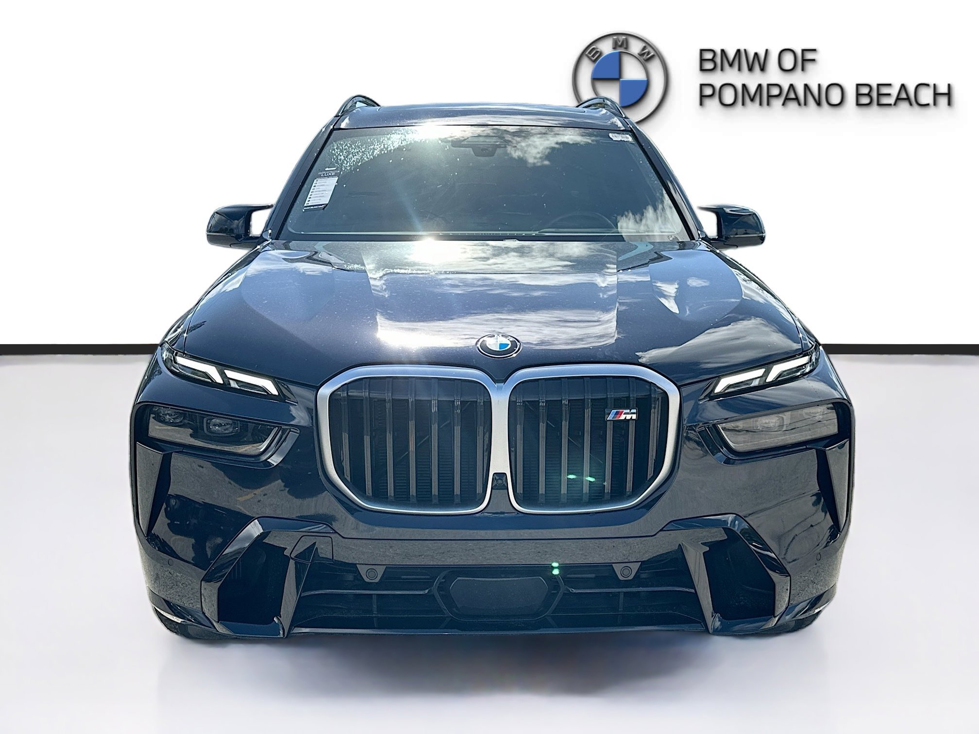 New 2025 Carbon Black Metallic BMW M60i image 2