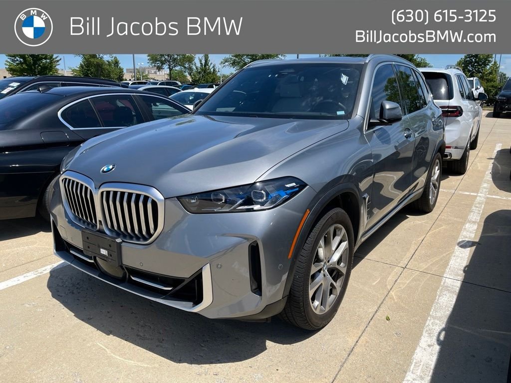 Certified Used 2024 Skyscraper Grey Metallic BMW xDrive40i image 1