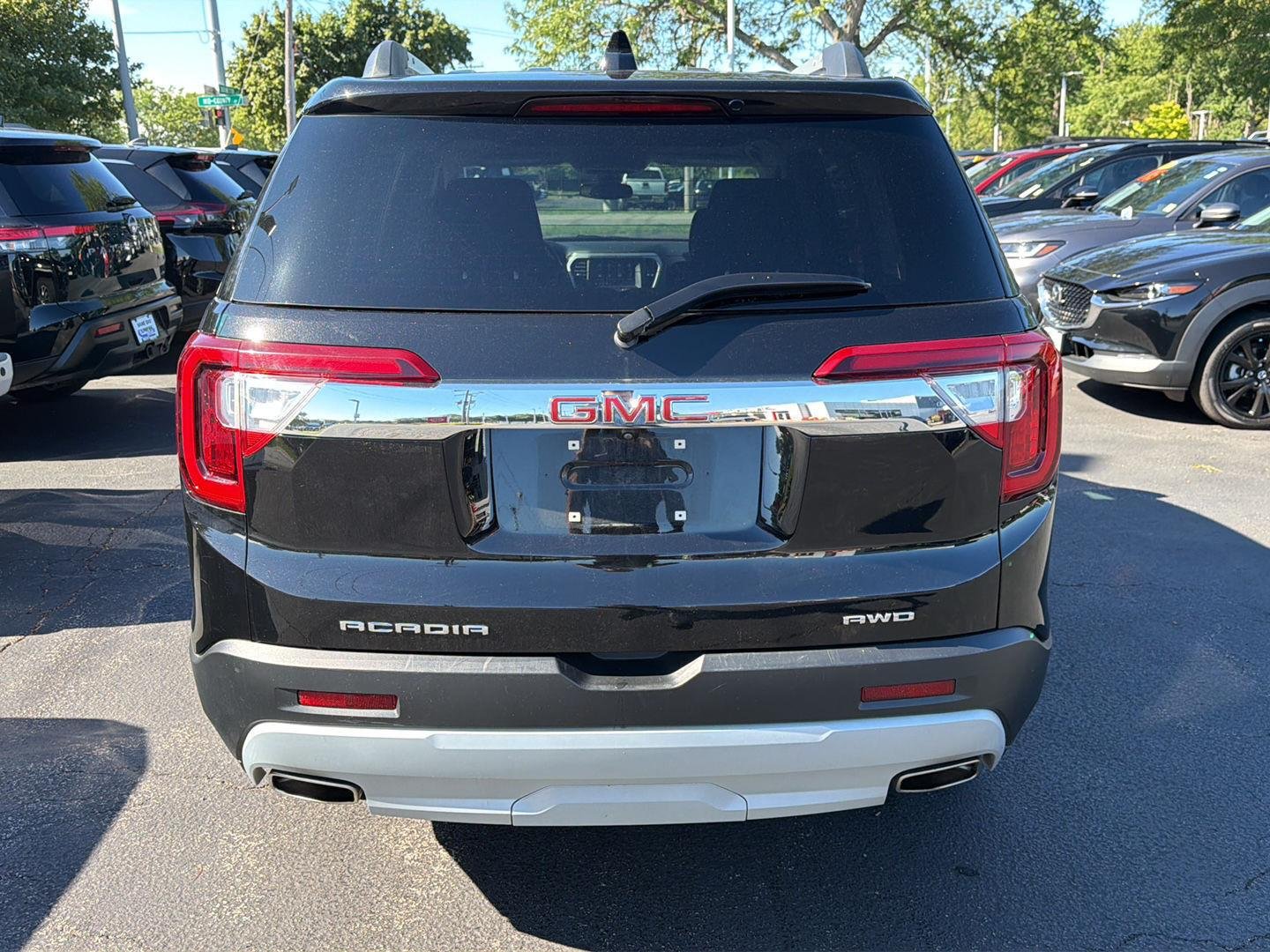 Used 2023 Ebony Twilight Metallic GMC SLE image 5