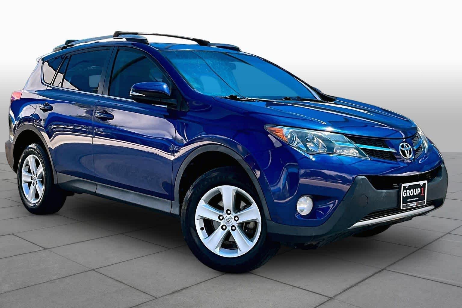Used 2014 Blue Crush Metallic Toyota XLE image 2