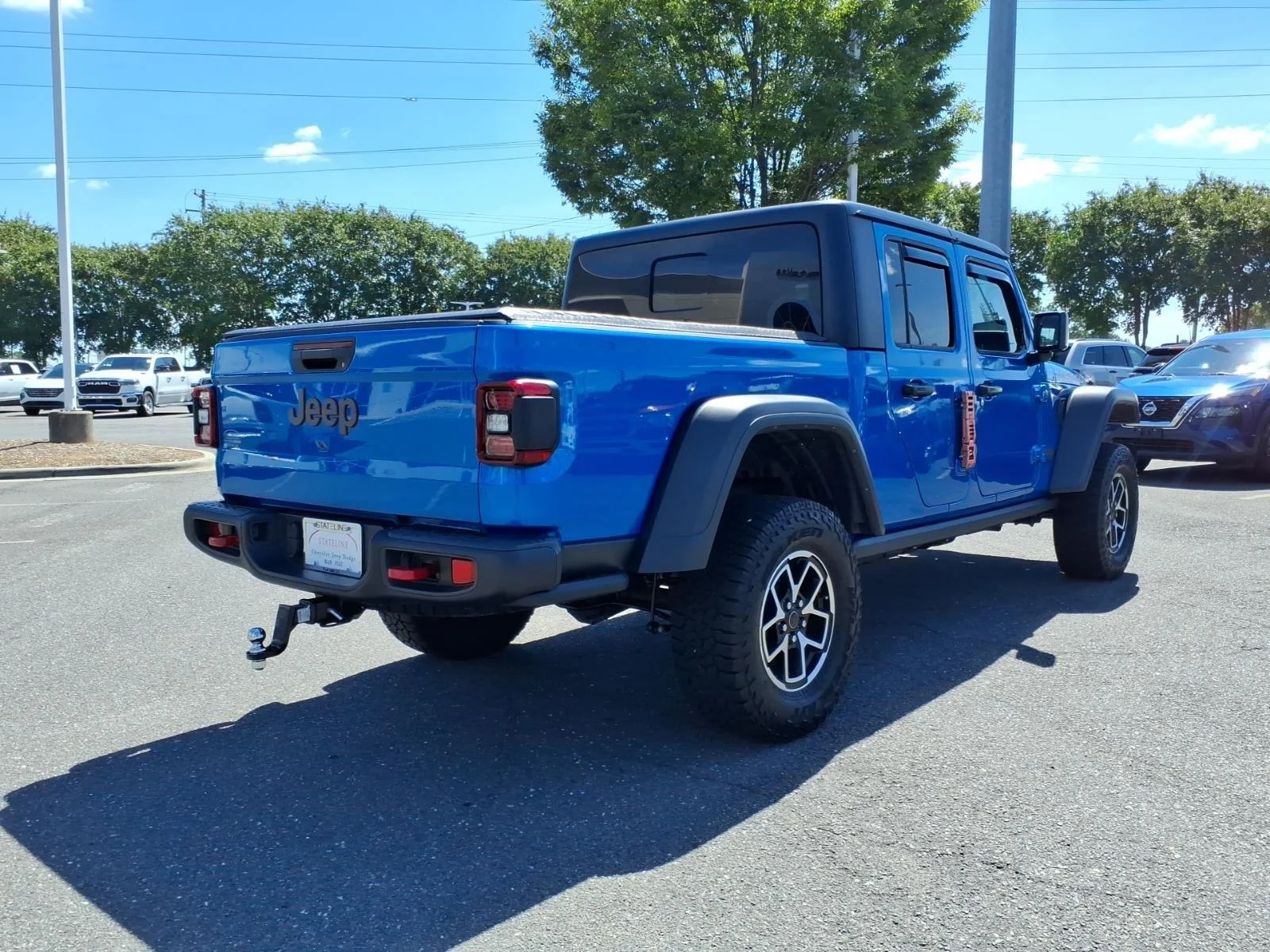 Used 2024 Hydro Blue Pearlcoat Jeep Rubicon image 2