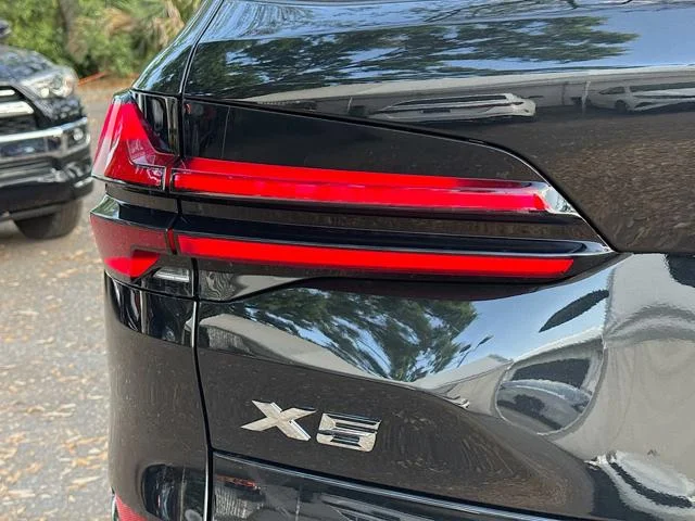 New 2026 Black Sapphire Metallic BMW xDrive50e image 10