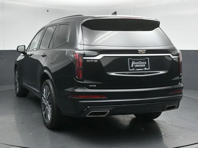Certified Used 2025 Stellar Black Metallic Cadillac Sport image 6