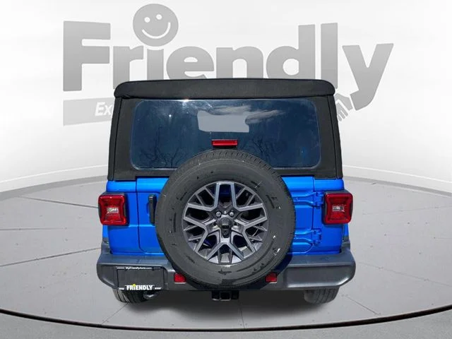 Used 2024 Blue Jeep Sahara image 6