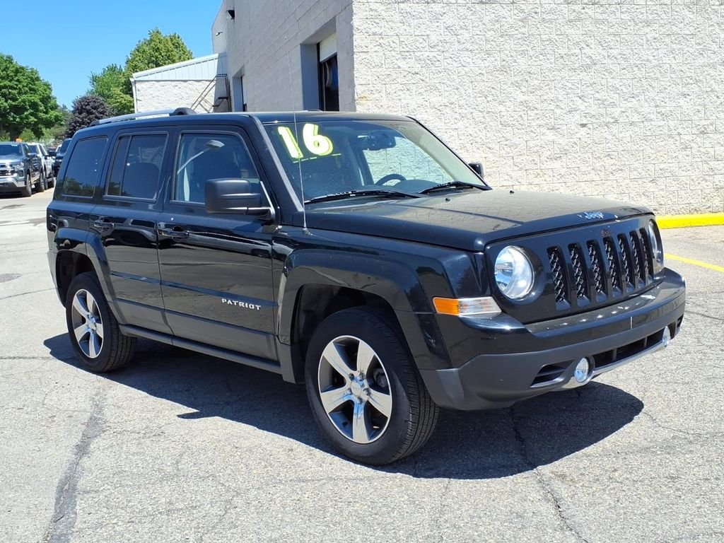 Used 2016 Black Jeep Latitude image 1