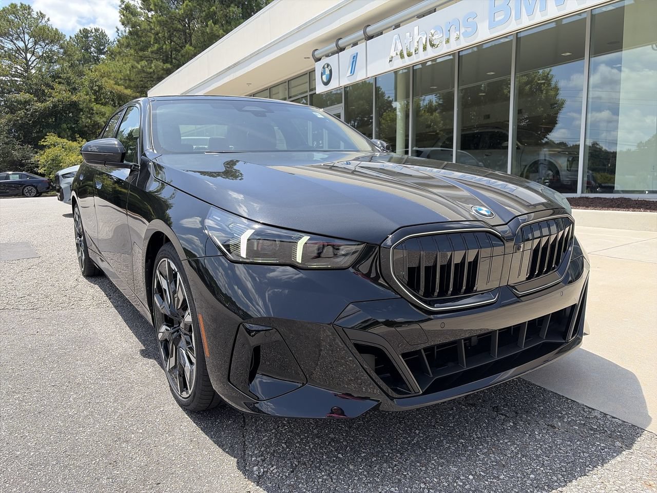 New 2027 Black Sapphire Metallic BMW 530i image 1