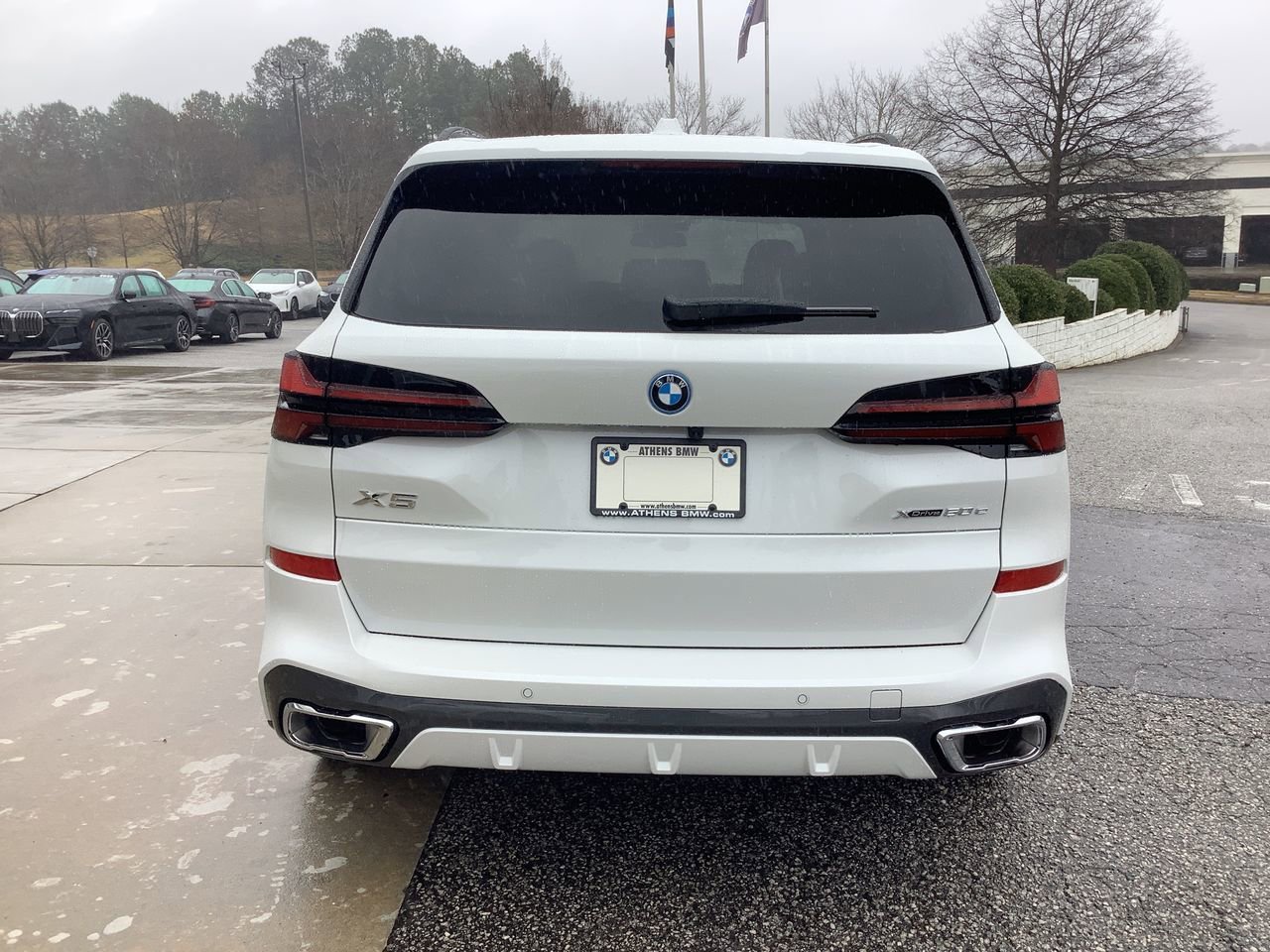 Used 2026 Mineral White Metallic BMW xDrive50e image 7