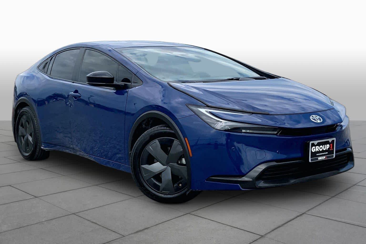 Used 2025 Reservoir Blue Toyota LE image 3