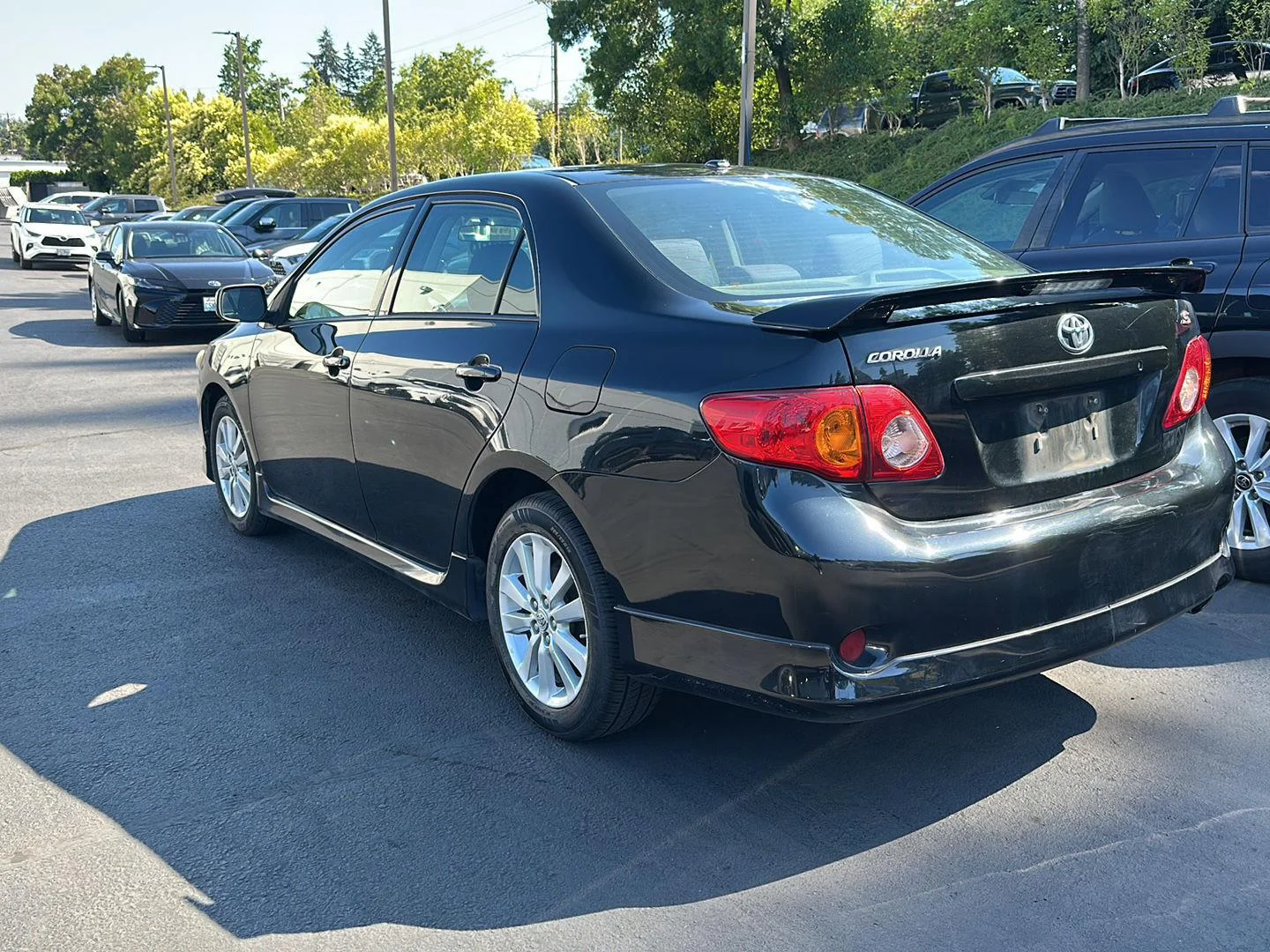 Used 2010 Black Sand Pearl Toyota S image 2