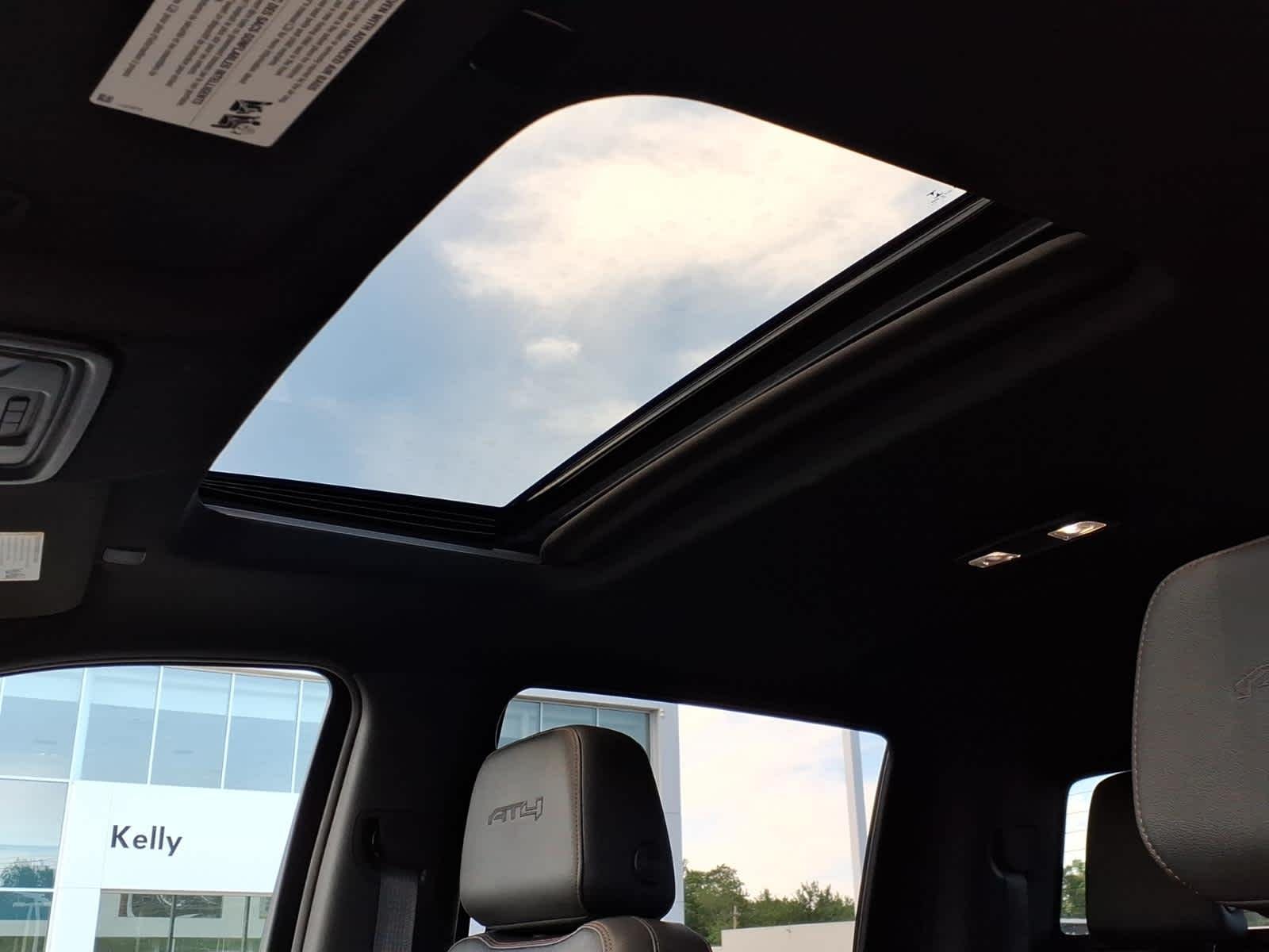 Used 2022 Ebony Twilight Metallic GMC AT4 image 17