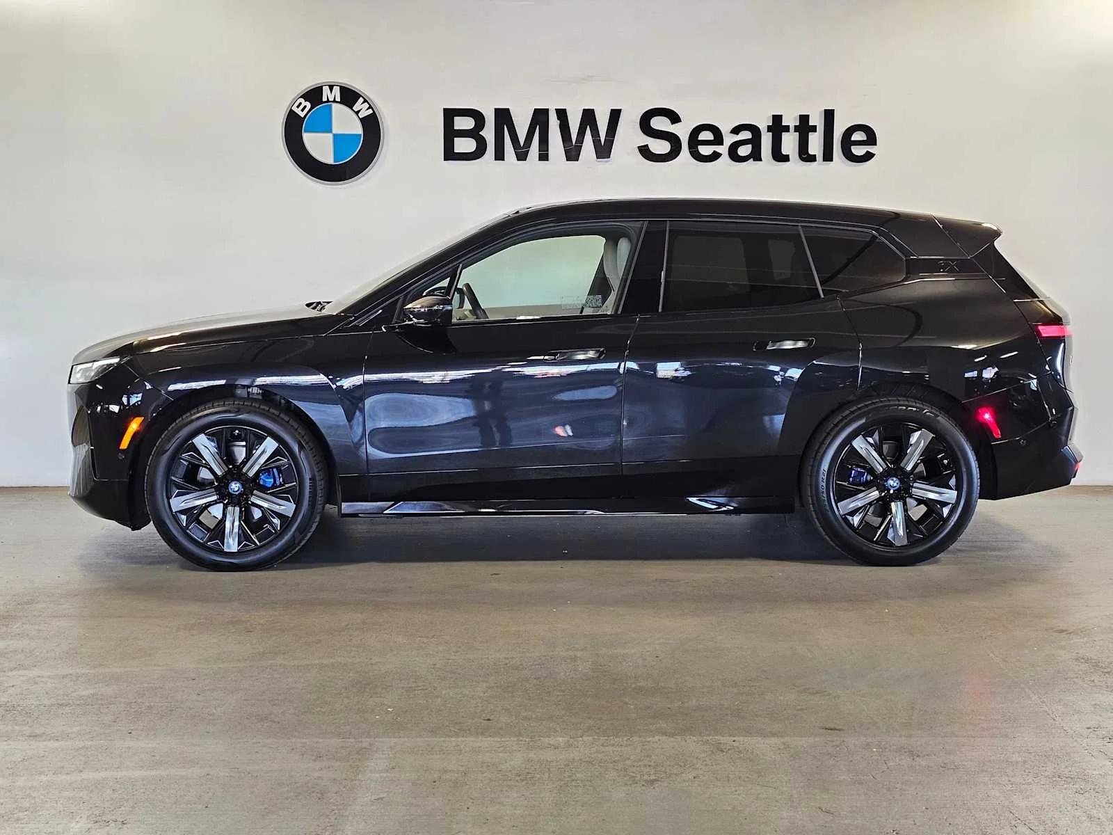 Certified Used 2024 Black Sapphire Metallic BMW xDrive50 image 3