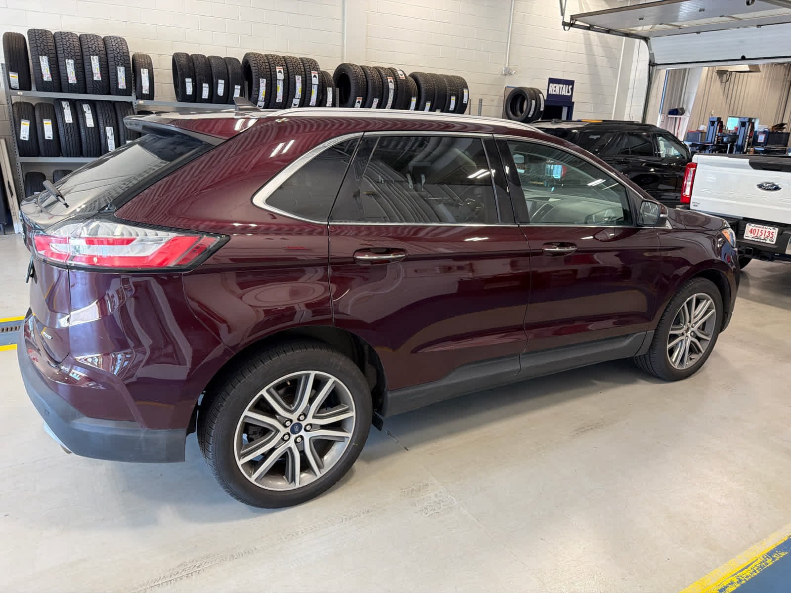 Used 2022 Burgundy Velvet Metallic Tinted Clearcoat Ford Titanium image 7