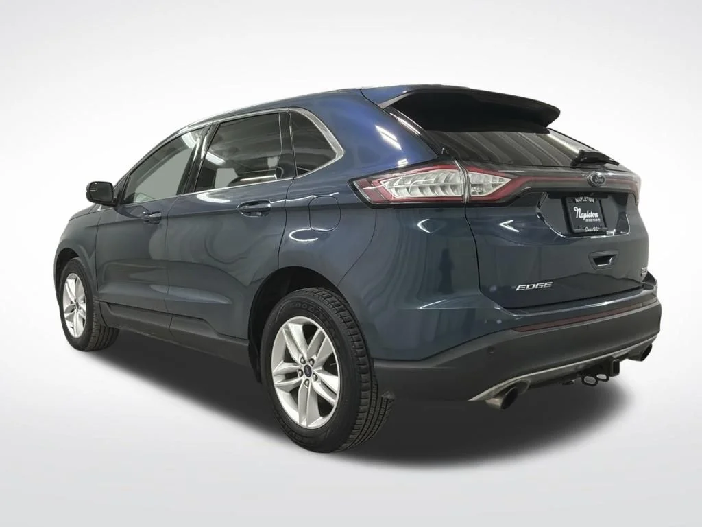 Used 2016 Blue Metallic Ford SEL image 2