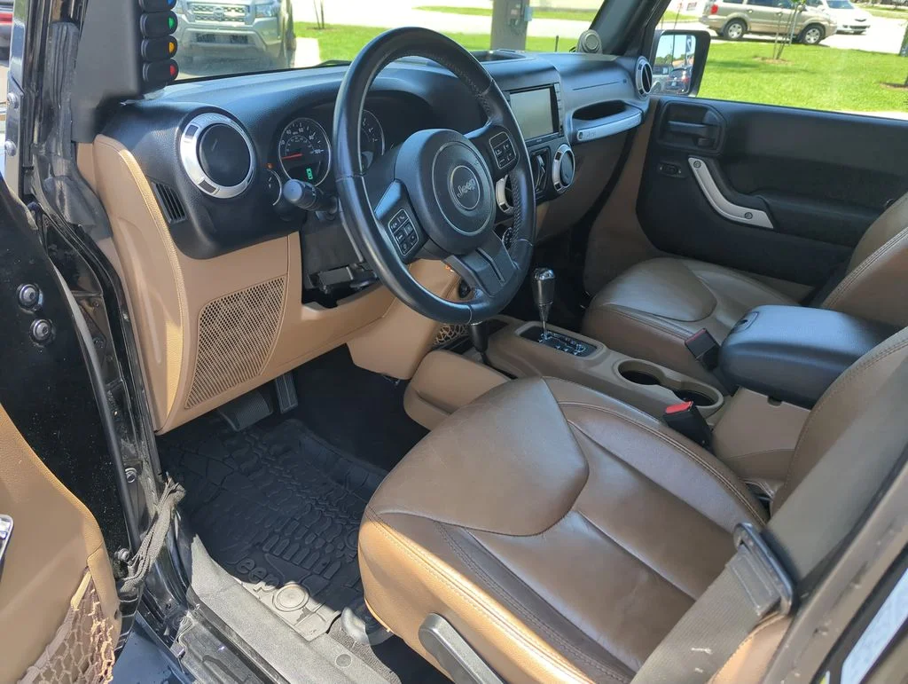 Used 2014 Black Jeep Unlimited Sahara image 11