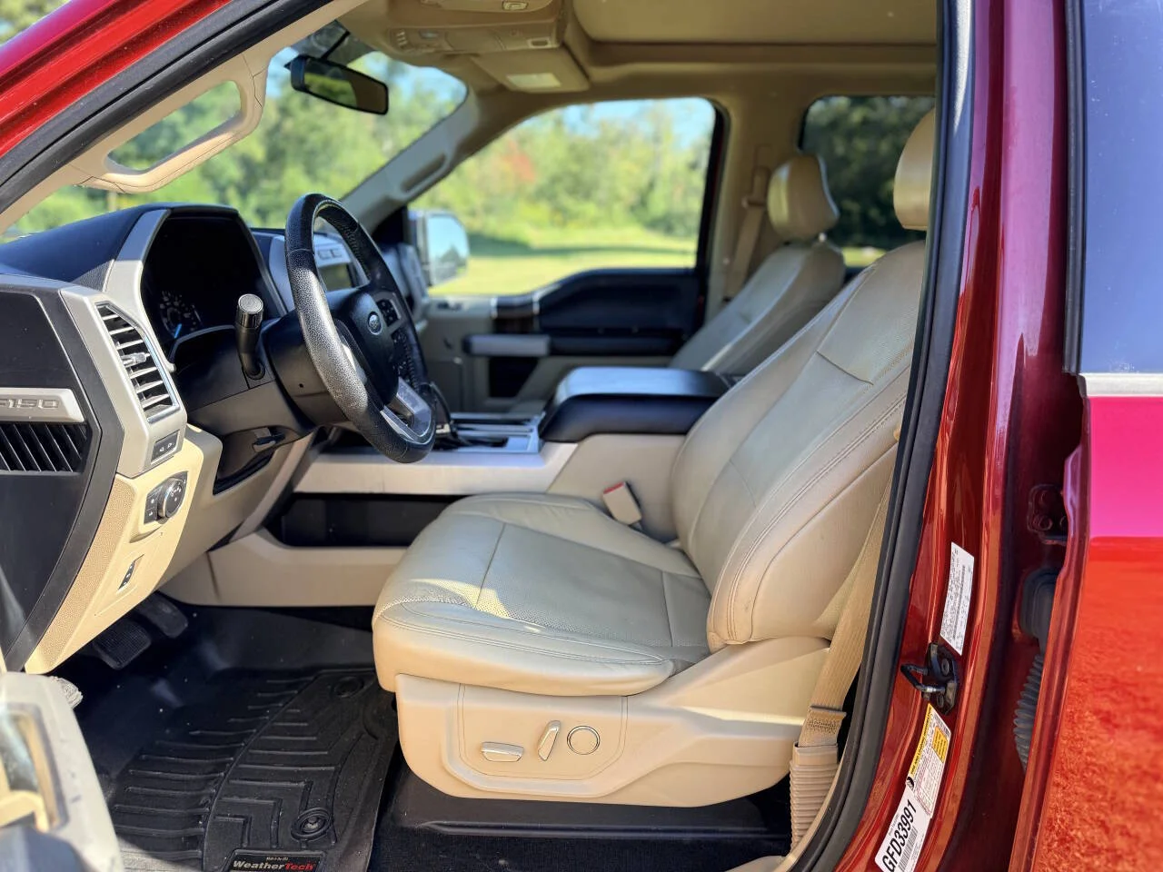 Used 2016 Red Ford Lariat 4x4 4dr SuperCrew 5.5 ft. SB image 26