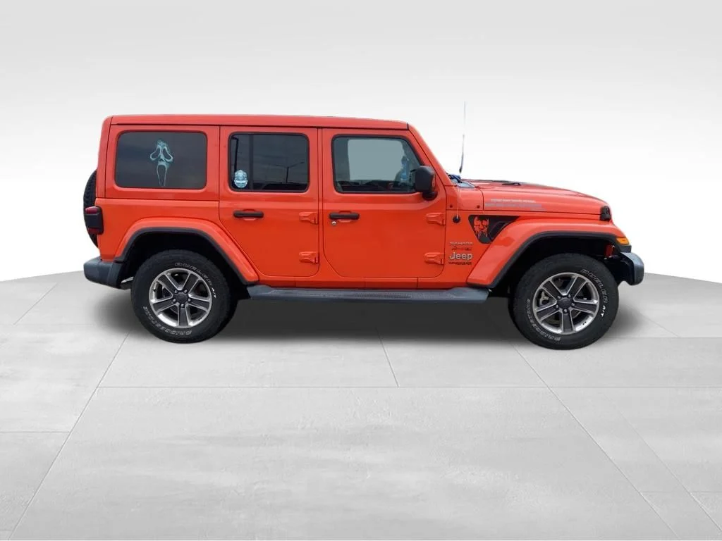 Used 2019 Orange Jeep Unlimited Sahara image 11
