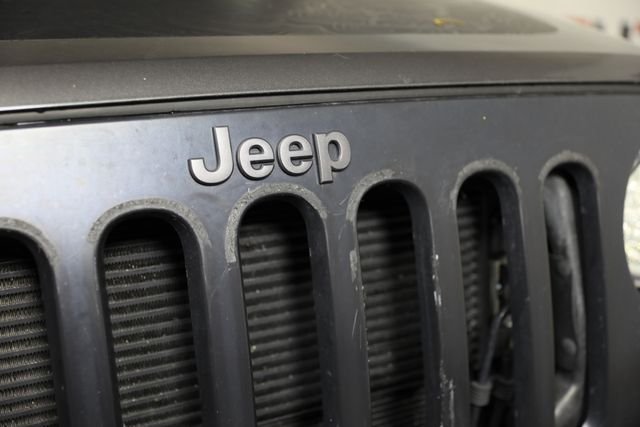 Used 2017 Gray Jeep Unlimited Sport image 23