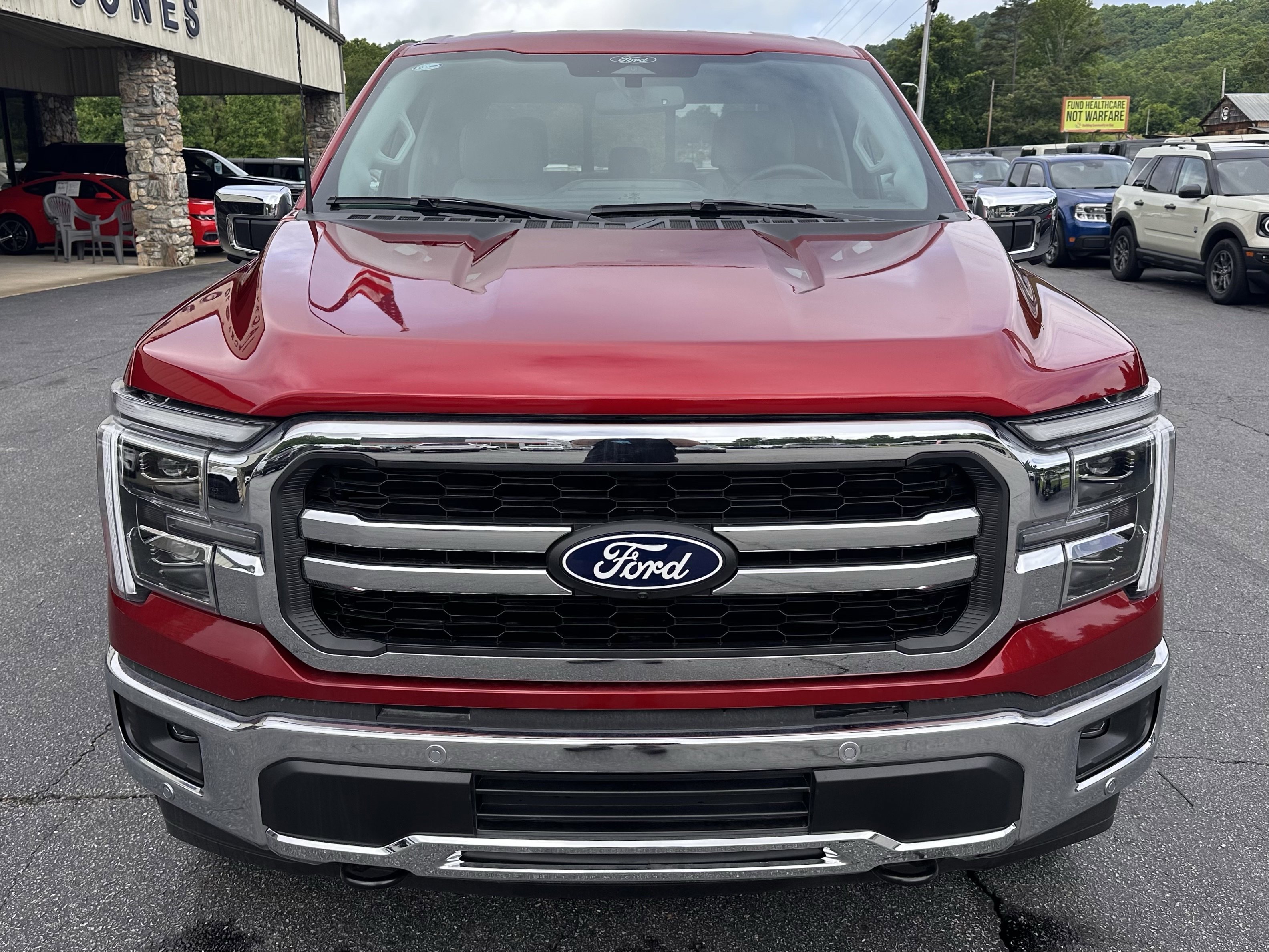 Certified Used 2026 Ruby Red Metallic Tinted Clearcoat Ford LARIAT image 3