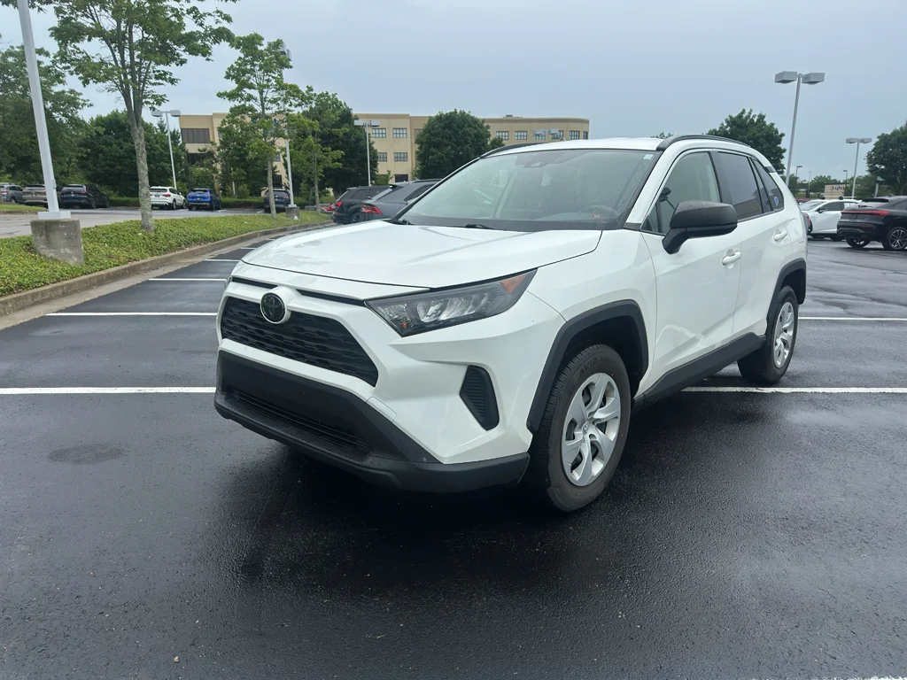 Used 2019 Super White Toyota LE image 1