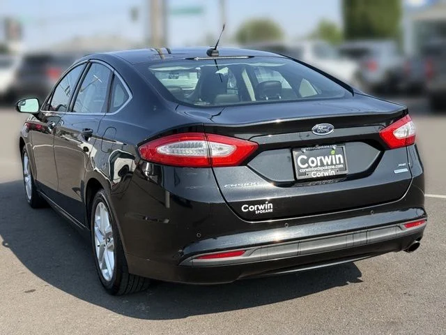 Used 2014 Tuxedo Black Metallic Ford SE image 14