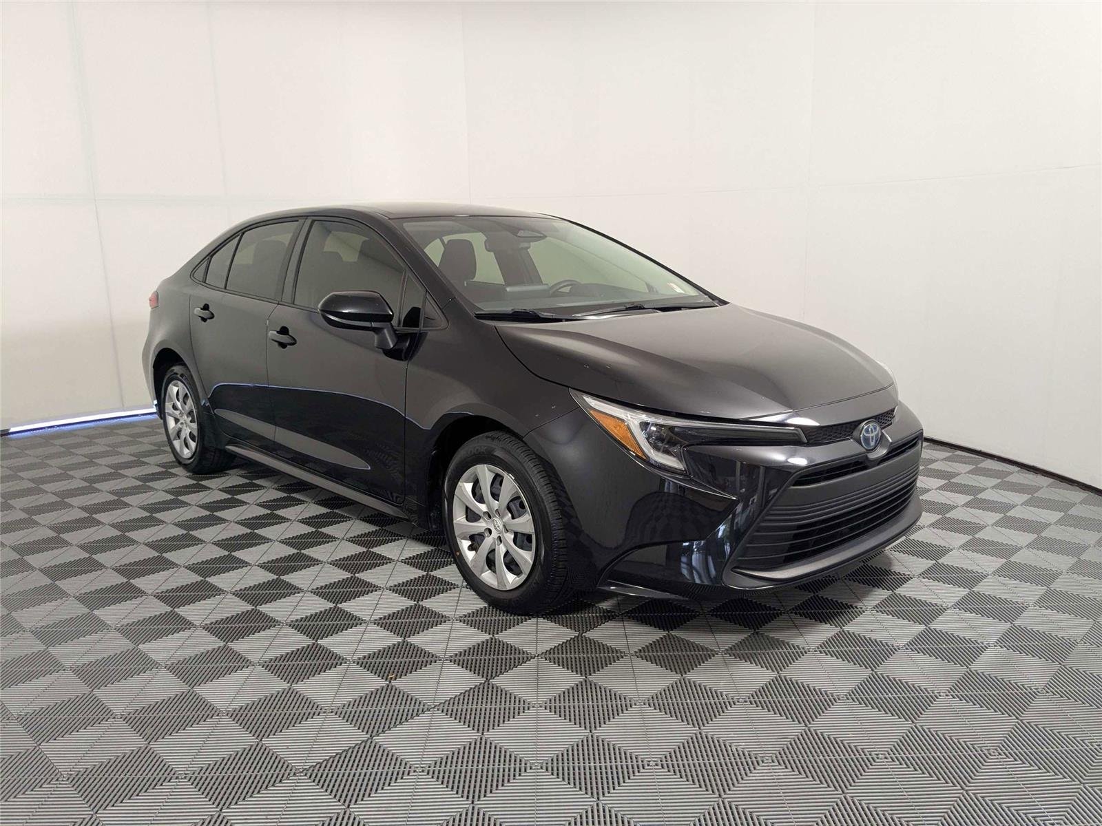 Certified Used 2024 Midnight Black Metallic Toyota Hybrid LE image 3