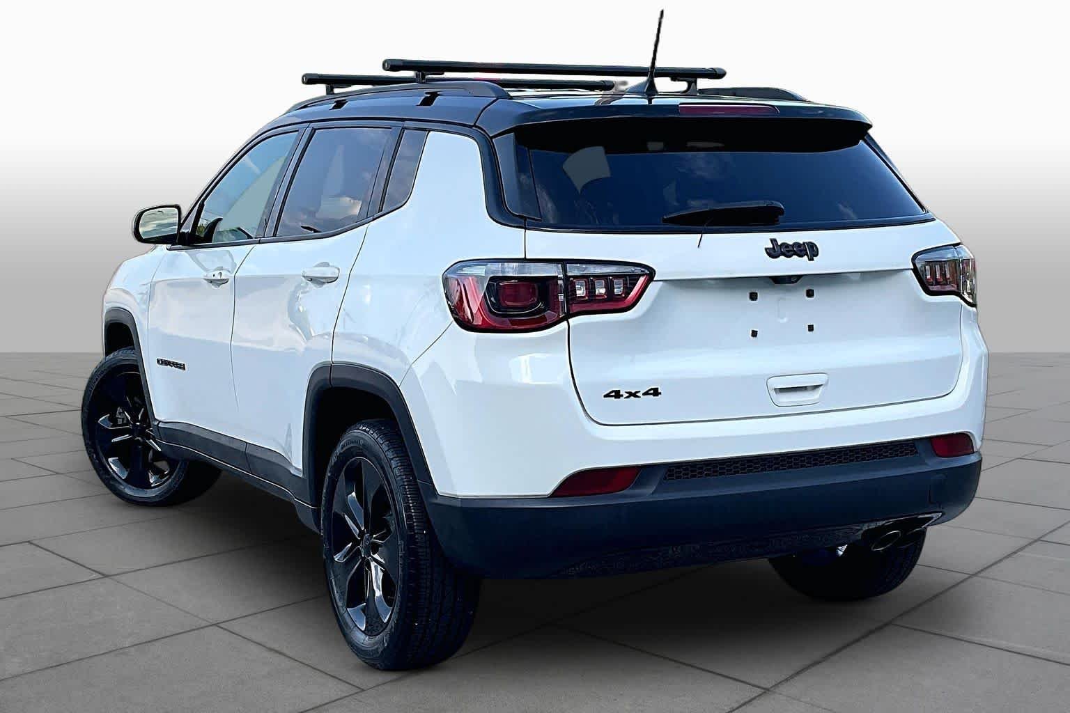 Used 2019 White Clearcoat Jeep Latitude image 12