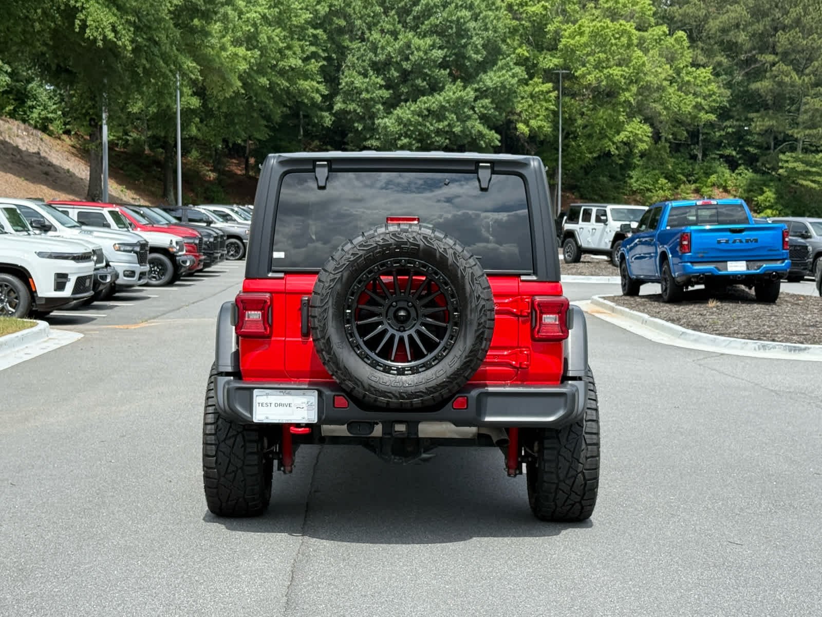 Used 2024 Firecracker Red Clearcoat Jeep Rubicon image 4