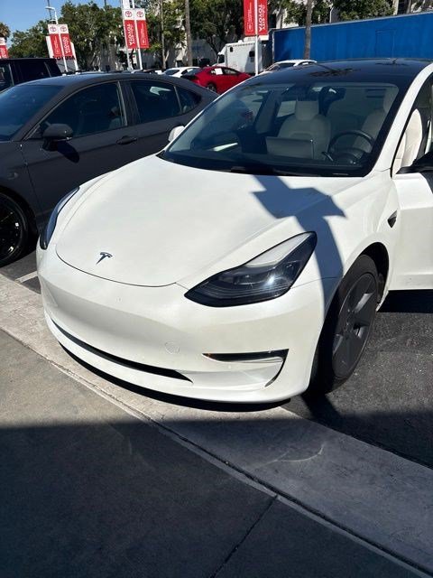 Used 2022 White Tesla Base image 1